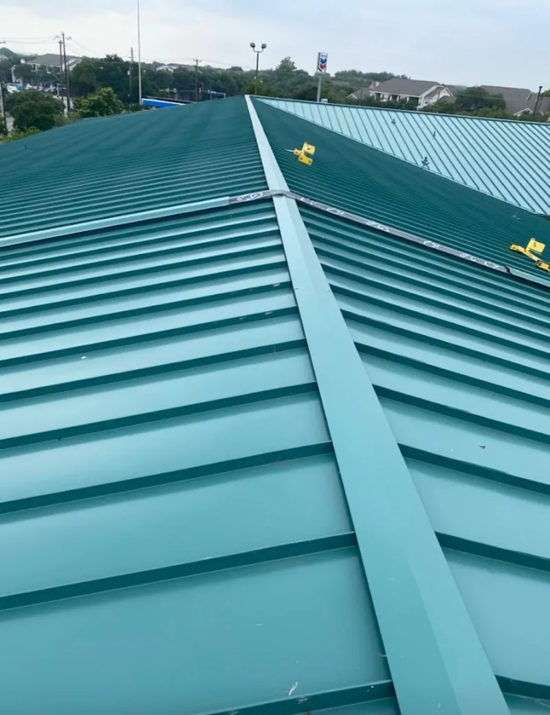 Green commercial metal roof ridge and valley for Metal Roof Repair in Oregon